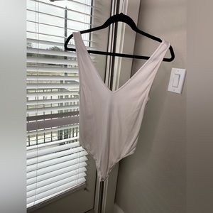 Express x Rocky Barnes white plunge neck body suit